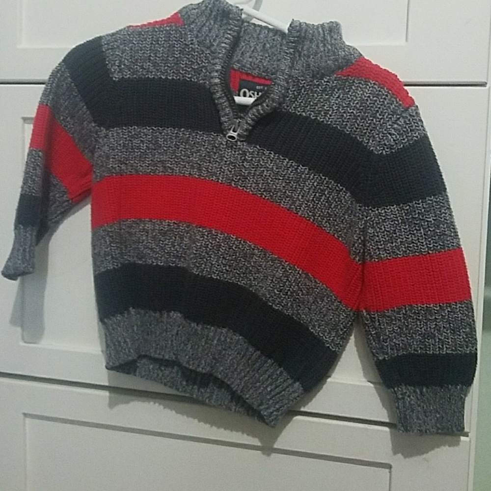 red and gray sweater